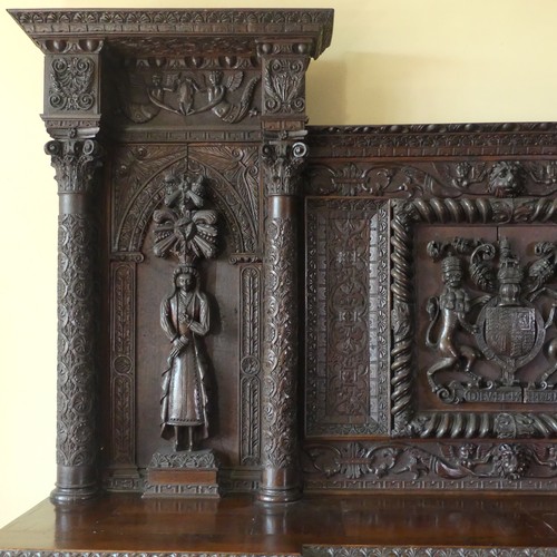 530 - A late 16thC to early 17thC, and later, heavily carved oak large inverted breakfront pedestal Sidebo... 