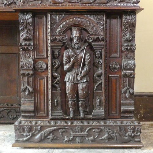 530 - A late 16thC to early 17thC, and later, heavily carved oak large inverted breakfront pedestal Sidebo... 