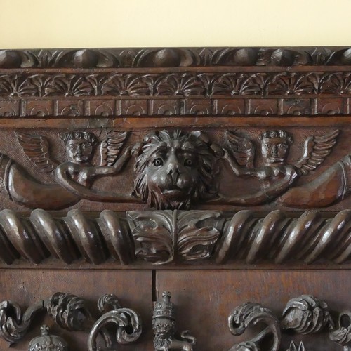 530 - A late 16thC to early 17thC, and later, heavily carved oak large inverted breakfront pedestal Sidebo... 