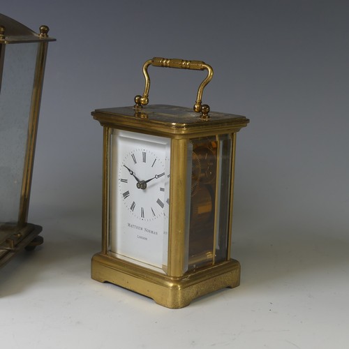 259 - A gilt-brass Carriage Clock, of five glass form with Swiss 11-jewels movement, signed Matthew Norman... 