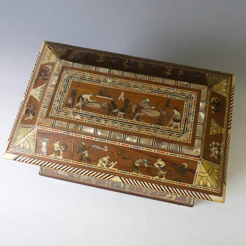 365 - An early 20thC Egyptian Revival Casket, of sarcophagus shape, with inlaid decoration, the hinged lid... 