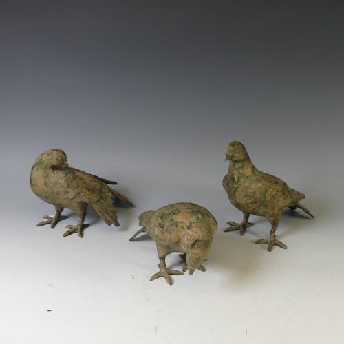 386 - A cast metal Pigeon Decoy, together with two others similar, all with remnants of gilding and green ... 