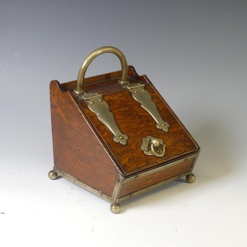 388 - An Edwardian oak Tea Caddy, modelled as a miniature coal scuttle, W 15cm x H 20cm x D 17cm.... 