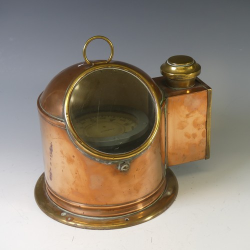 429 - An antique copper and brass cased Ship's Binnacle, with circular glass viewing panel and with lamp b... 