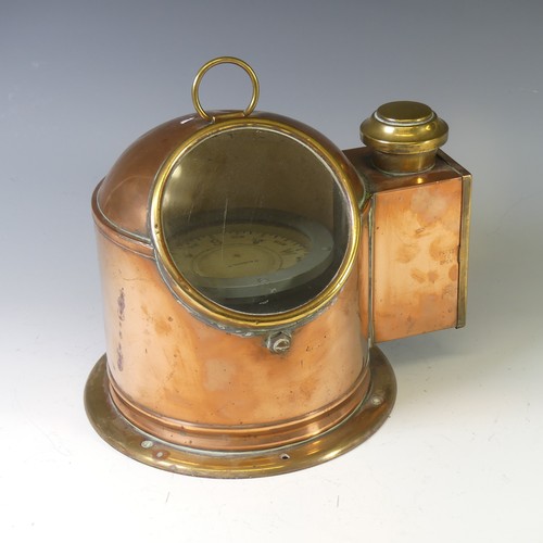 429 - An antique copper and brass cased Ship's Binnacle, with circular glass viewing panel and with lamp b... 