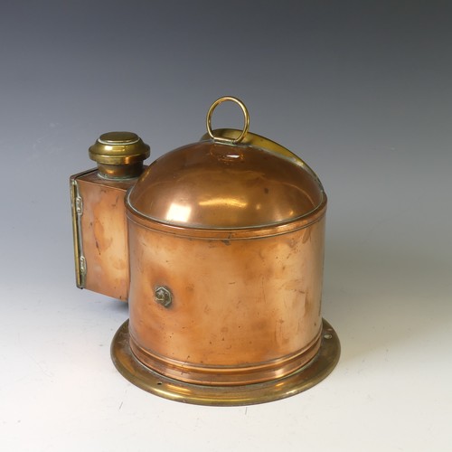 429 - An antique copper and brass cased Ship's Binnacle, with circular glass viewing panel and with lamp b... 