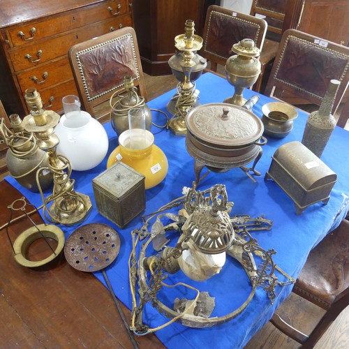 512 - A quantity of antique brass and Copperwares, to include Lamp Bases, Oil Lamps, Ceiling Lights, Caske... 