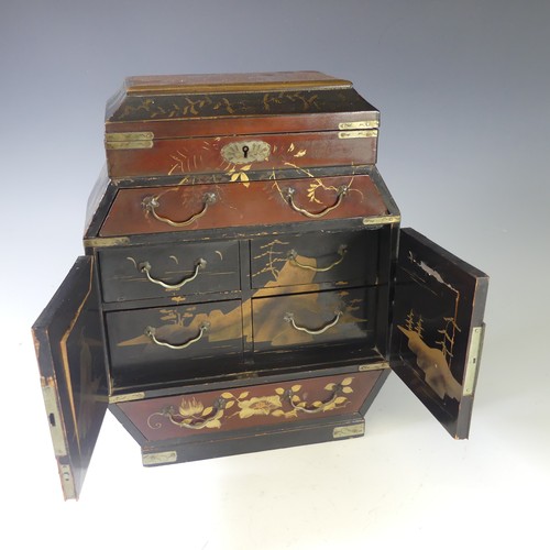 130 - An early 20thC Japanese lacquer Casket, the whole decorated in gold on black and red lacquer with tr... 