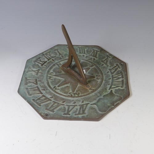 276 - Garden Statuary; a decorative metal Sundial, of octagonal form, 27cm wide.