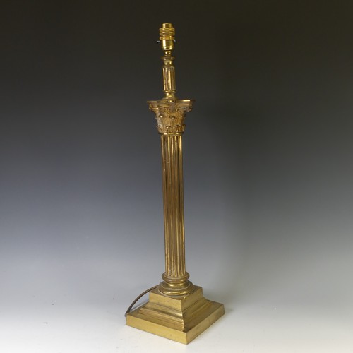 511 - A vintage brass Corinthian Column Table Lamp, on stepped square base, H 65cm.