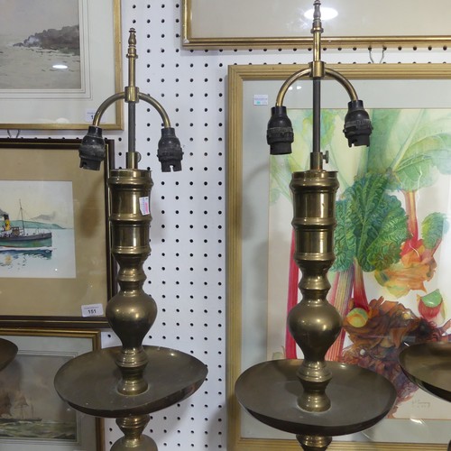 497 -  A pair of heavy Oriental turned brass Table Lamps, with bobbin turned shafts, drip trays and circul... 