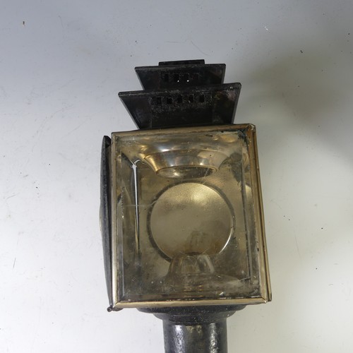 558 - A pair of black painted Coach Lamps, with bevelled glass and holders, H 45cm, broken glass, together... 