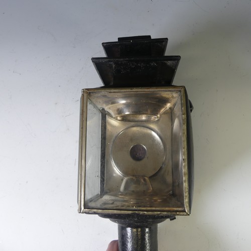 558 - A pair of black painted Coach Lamps, with bevelled glass and holders, H 45cm, broken glass, together... 