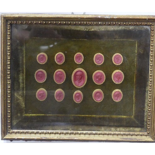 358 - A group of fifteen Grand Tour red wax Intaglio Seals, depicting various Roman Emperors, in glazed fr... 