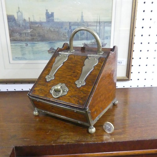 388 - An Edwardian oak Tea Caddy, modelled as a miniature coal scuttle, W 15cm x H 20cm x D 17cm.... 