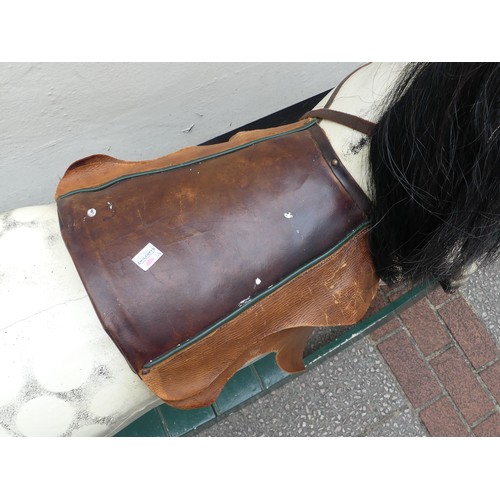 507 - An early 20thC grey dapple painted Rocking Horse, with mane, leather saddle and tack, on wooden rock... 