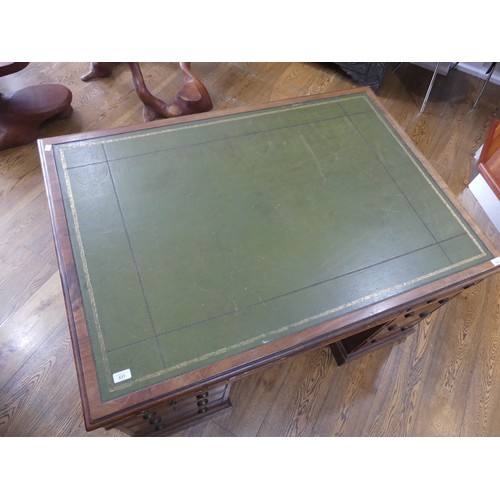 531 - An Edwardian twin Pedestal desk, the rectangular top inset with tooled green skiver, above three fri... 