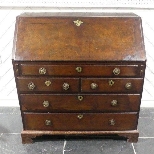 508 - A George III mahogany Bureau, the fall front with engraved escutcheon opening to reveal a fitted int... 