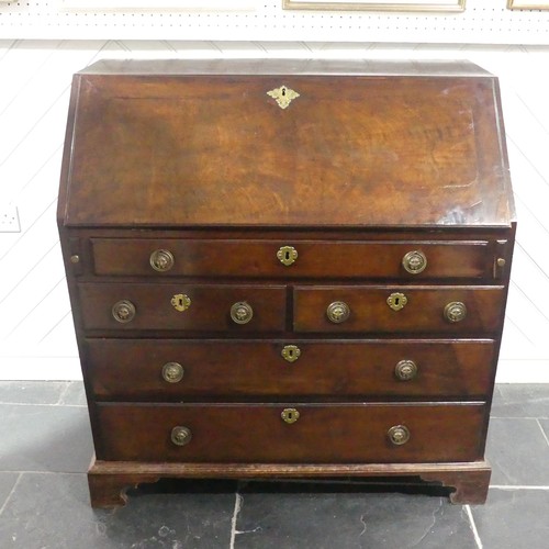 508 - A George III mahogany Bureau, the fall front with engraved escutcheon opening to reveal a fitted int... 