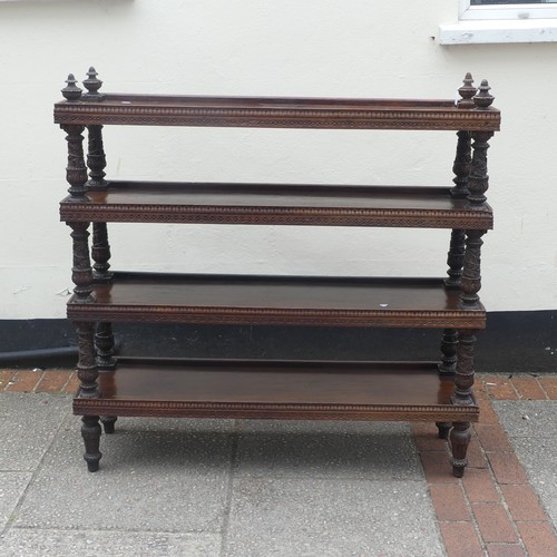 526 - A 19th century Anglo-Indian carved hardwood four-tier Whatnot, with turned and carved supports, and ... 