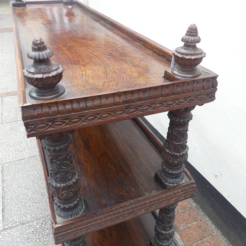 526 - A 19th century Anglo-Indian carved hardwood four-tier Whatnot, with turned and carved supports, and ... 