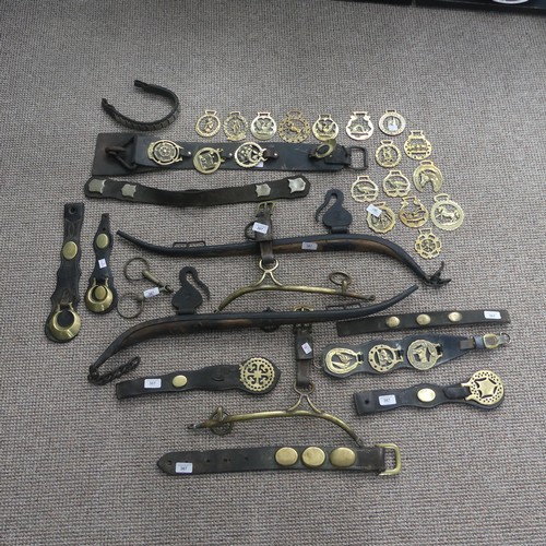 367 - A quantity of Victorian Martingales, together with loose horse brasses, name plates, cast iron and w... 