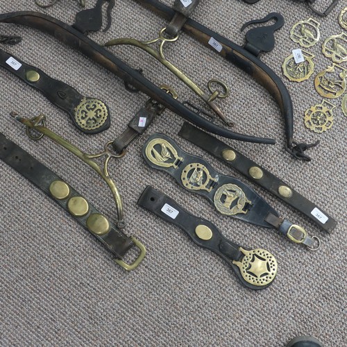 367 - A quantity of Victorian Martingales, together with loose horse brasses, name plates, cast iron and w... 