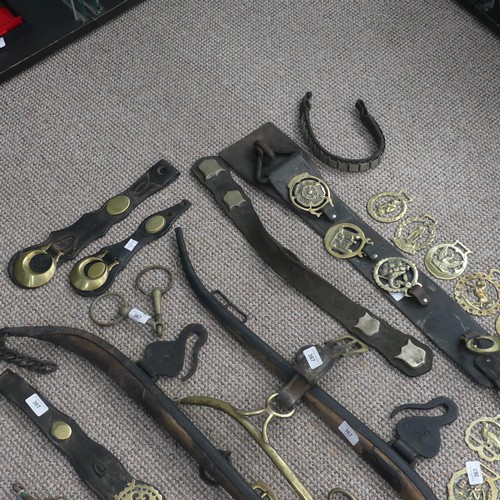 367 - A quantity of Victorian Martingales, together with loose horse brasses, name plates, cast iron and w... 