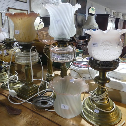 471 - A small quantity of brass Oil Lamp Bases, with glass reservoirs, tallest 75cm overall, together with... 