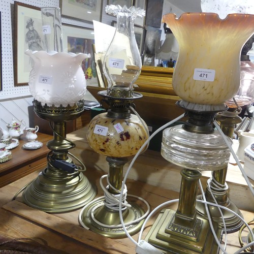 471 - A small quantity of brass Oil Lamp Bases, with glass reservoirs, tallest 75cm overall, together with... 