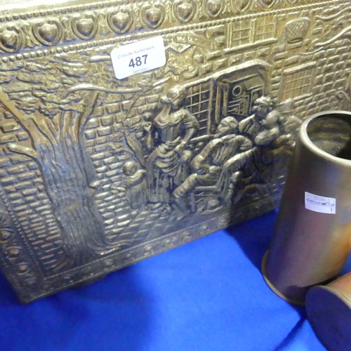 487 - A quantity of Copper and Brasswares, to include a copper Arts and Crafts Charger, brass Coal Scuttle... 