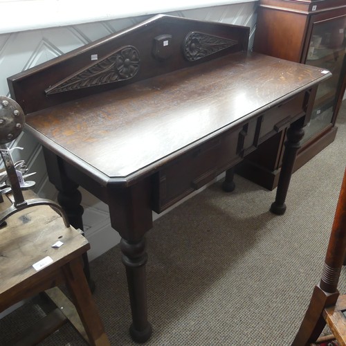 478 - A Victorian mahogany Side Table, with carved gallery back above two frieze drawers, on turned suppor... 