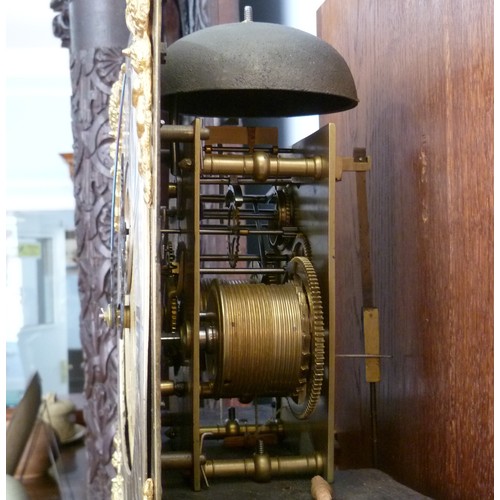 264 - A walnut and feather-banded Longcase Clock, by Thomas Elliott, Greenwich, early 18th century and lat... 