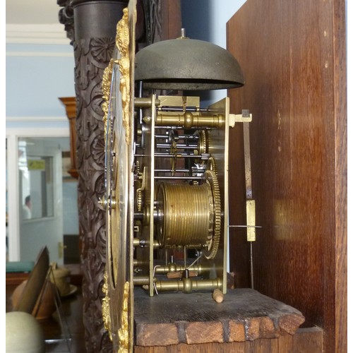 264 - A walnut and feather-banded Longcase Clock, by Thomas Elliott, Greenwich, early 18th century and lat... 