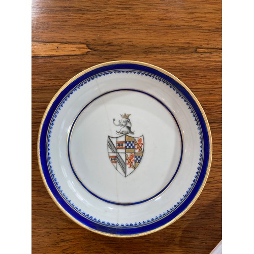 144 - An 18thC Chinese export armorial porcelain Teabowl and Saucer, decorated with gilt and blue banding ... 