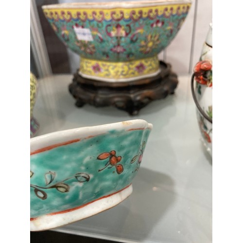 86 - An antique Chinese famille rose Tea Pot, decorated in floral enamels, together with a Chinese famill... 