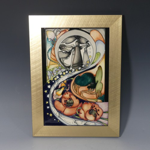 A Moorcroft 'Stars at Dawn' framed Plaque, tube lined decoration on dark blue ground, of second quality, designed by Emma Bossons, factory marks to base dated 2006, frame 28cm x 39cm.