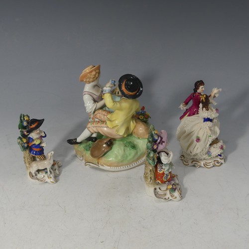 92 - A Dresden porcelain Figural Group, depicting a gentleman reclining next to a lamb with the lady feed... 