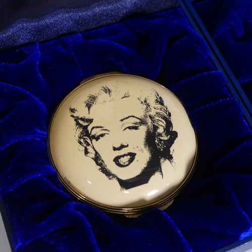 49 - A limited edition Halcyon Days enamel Box, depicting 'Gold Marilyn' after Andy Warhol (102/500), tog... 