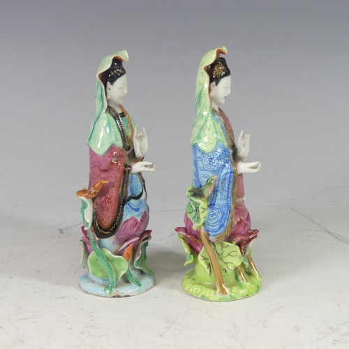 34 - A pair of Chinese porcelain Guanyin Figures, each polychrome decorated, possibly Chien-Lung period, ... 