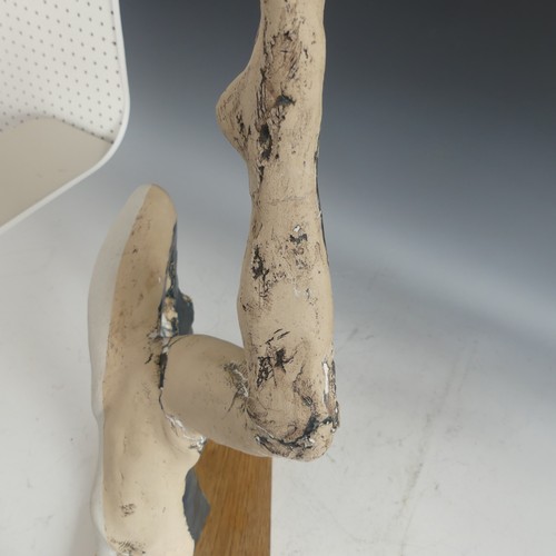 492 - A Paul Donovan studio pottery 'Ballerina' sculpture, signed and dated 14 to arm, raised on a wooden ... 