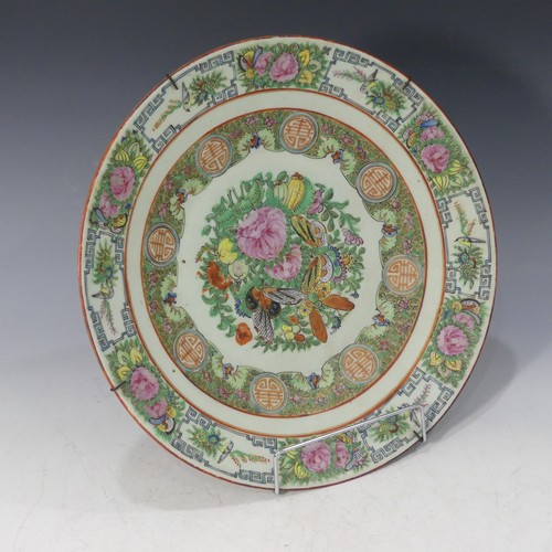 131 - A Chinese porcelain famille verte Charger, decorated with insects and floral swags, character mark t... 