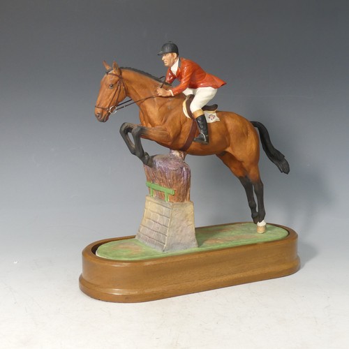 A Royal Worcester limited edition equestrian model of Foxhunter and Lt Col. HM Llewellyn C.B.E., designed by Doris Lindner, introduced 1980, H 28.5cm overall, with plinth but lacking certificate of authenticity (2)