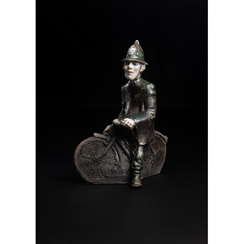 Lawson E. Rudge (b. 1936), a raku fired studio pottery sculpture of the village Policeman, modelled riding a motorcycle, H 32cm.
