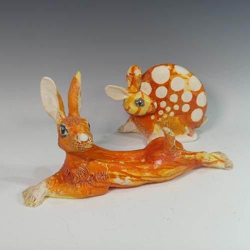 118 - Lawson E. Rudge (b. 1936), a raku fired studio pottery sculpture of a flat Bunny, with orange decora... 