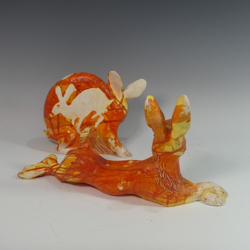 118 - Lawson E. Rudge (b. 1936), a raku fired studio pottery sculpture of a flat Bunny, with orange decora... 