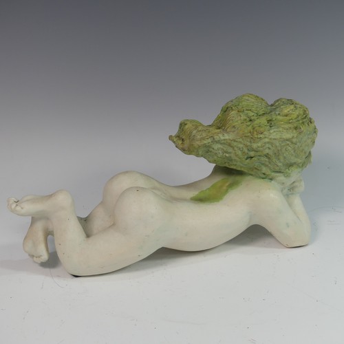 132 - Lawson E. Rudge (b. 1936), a raku fired studio pottery sculpture of a Baby, modelled laying on her s... 