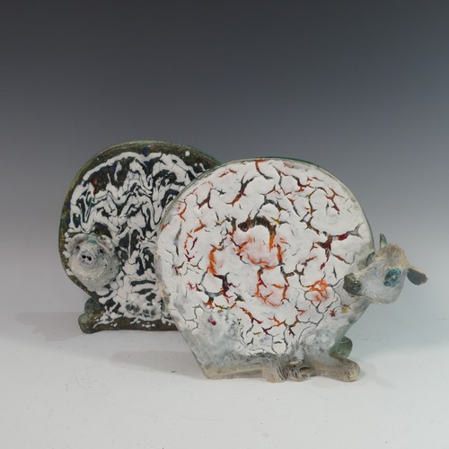 117 - Lawson E. Rudge (b. 1936), a raku fired studio pottery sculpture of a round Cow, H 27cm, together wi... 