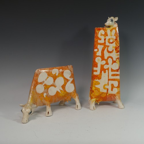 120 - Lawson E. Rudge (b. 1936), a raku fired studio pottery sculpture of a elongated Cow, with orange abs... 