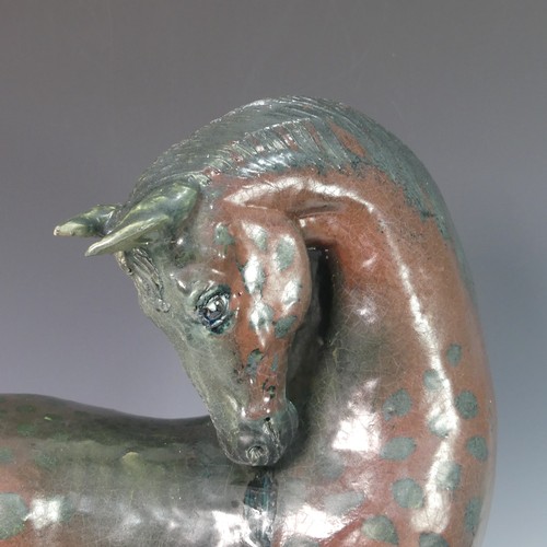 64 - Lawson E. Rudge (b. 1936), a raku studio pottery sculpture of a Tang Horse, H 60cm.Provenance: from ... 